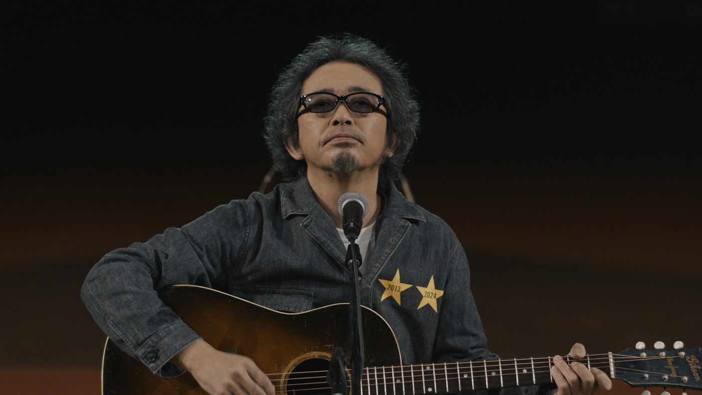 奥田民生、“サッポロ生ビール黒ラベル”TVCM「大人エレベーター」に11年ぶり再登場